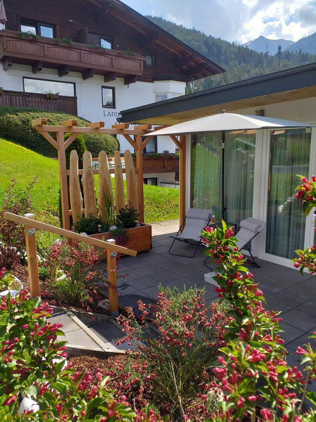 Landhaus Almidyll เซเฟลด์ อิน ทิโรล ภายนอก รูปภาพ